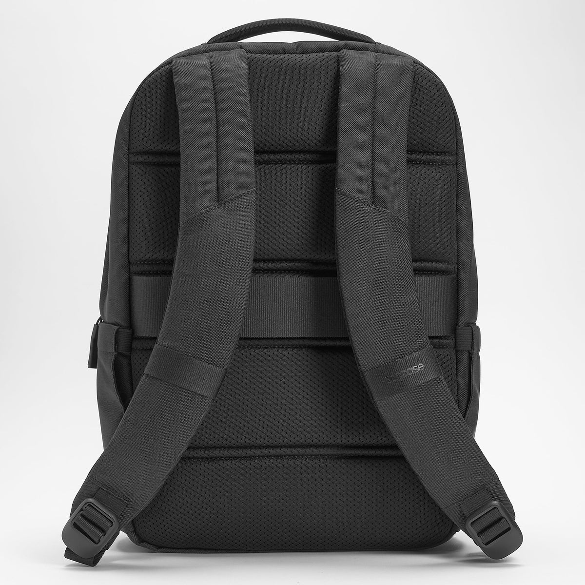 Rear product image displaying padded breathable mesh back panel, adjustable shoulder straps and integrated luggage strap for enhanced comfort and travel convenience.