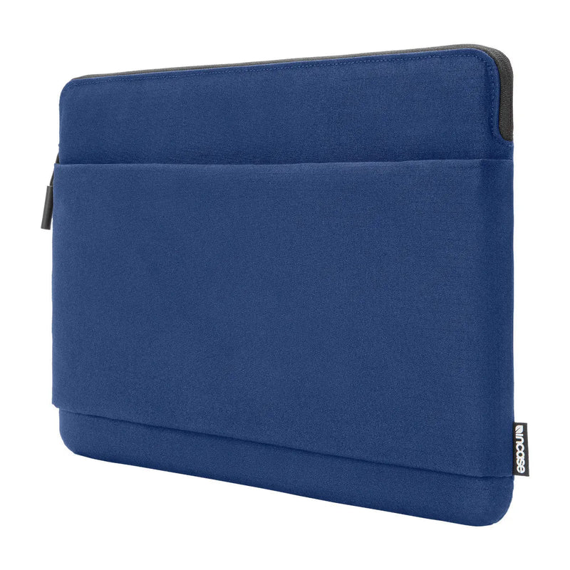 Incase Go Sleeve for 14-inch laptops in navy, angled three-quarter view on a white background