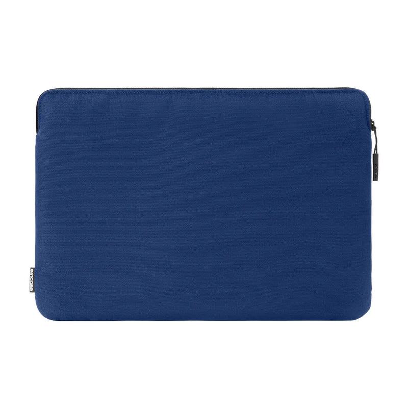 Back view of the navy Incase Go Sleeve for 14-inch laptops, as photographed by Incase