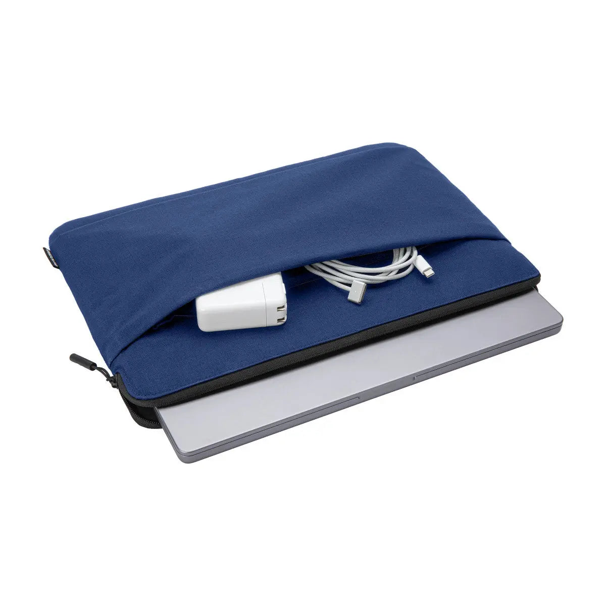 Navy Incase Go Sleeve lying flat with a laptop partly inserted and a charger and cable in the front pocket