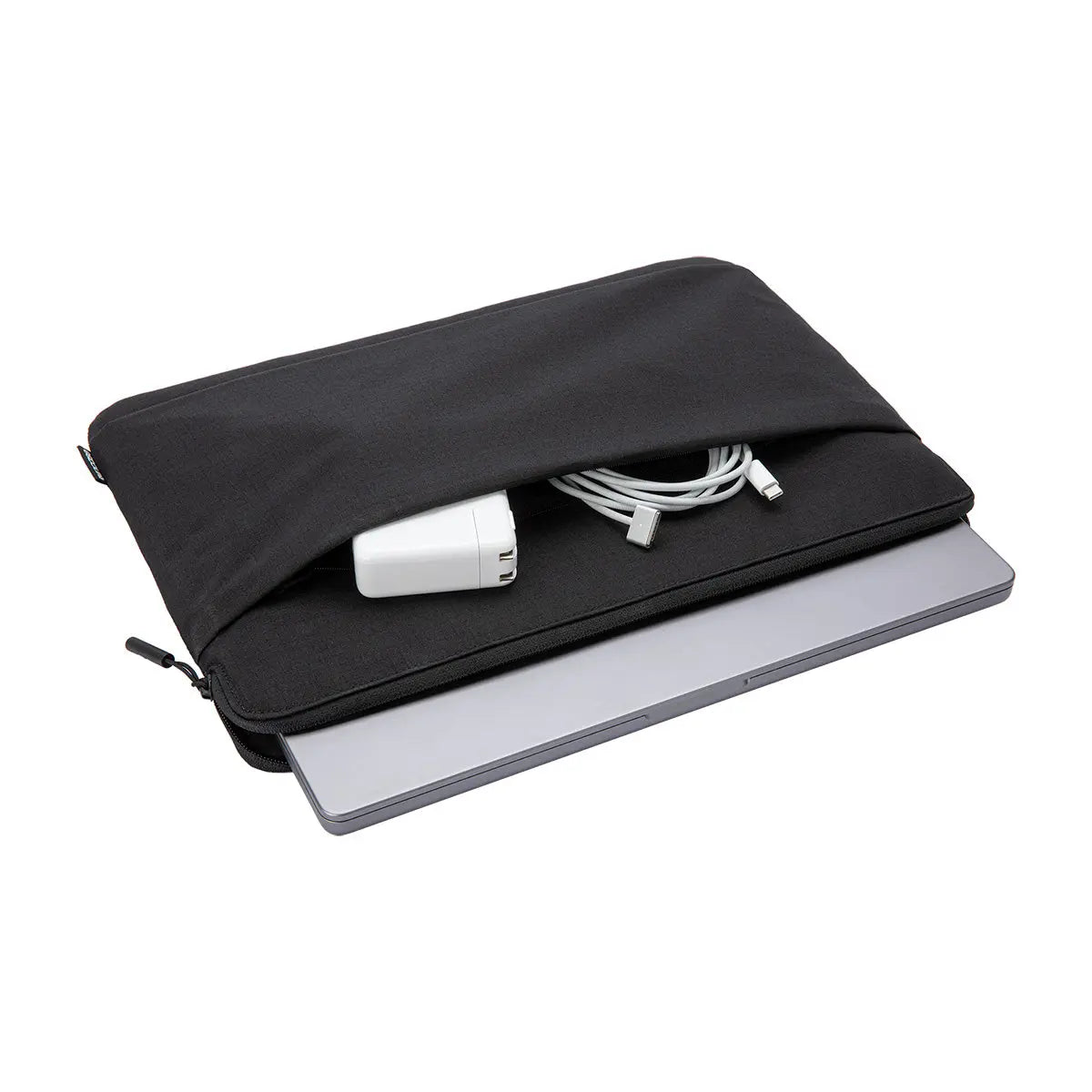 Black Incase Go Sleeve lying flat with a laptop partly inserted and a charger and cable in the front pocket