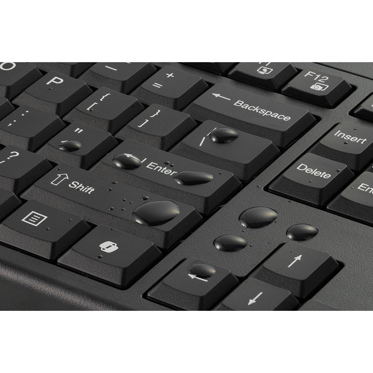 Kensington KM270 EQ Rechargeable Desktop Set keyboard close-up with water droplets on the Enter and arrow keys