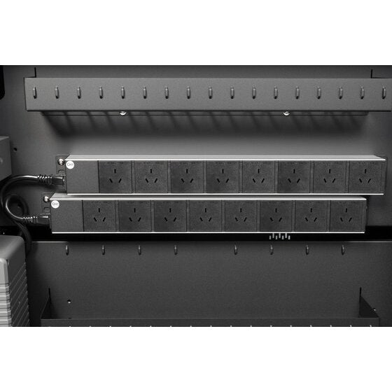 Close up of the power boards inside the Kensington AC32 cabinet with rows of Australian style three pin outlets