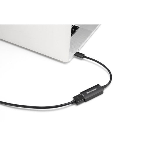 Kensington CV4200H adapter plugged into a silver laptop USB-C port with an HDMI cable connected to its socket
