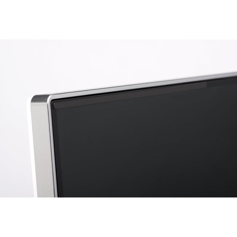 Close up view of the magnetic attachment strip fitted along the top edge of a slim bezel monitor, demonstrating the discreet and professional installation system.