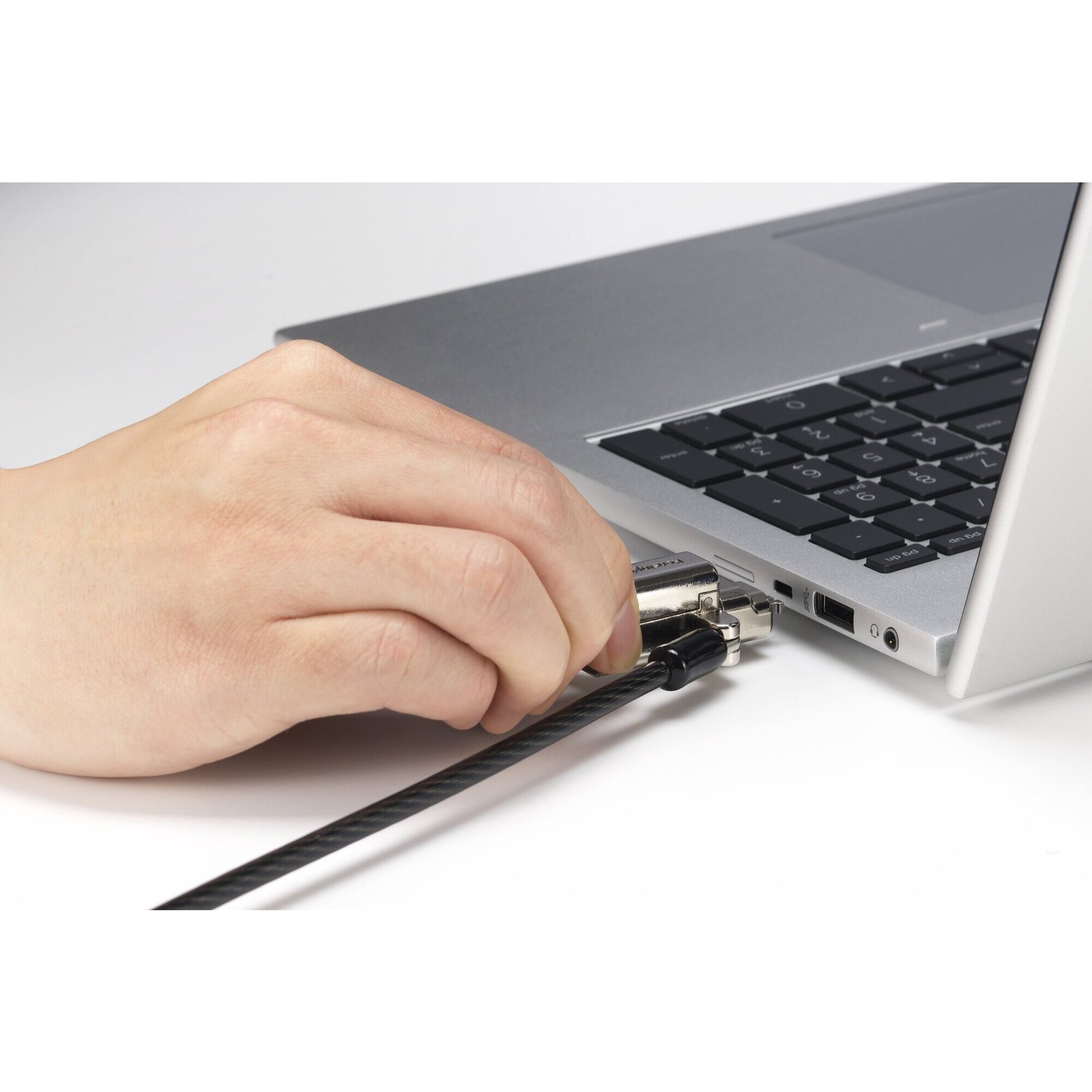 Kensington Universal 3-in-1 2.0 keyed laptop lock shown with its retail packaging, black lock head and cable presented against a white background