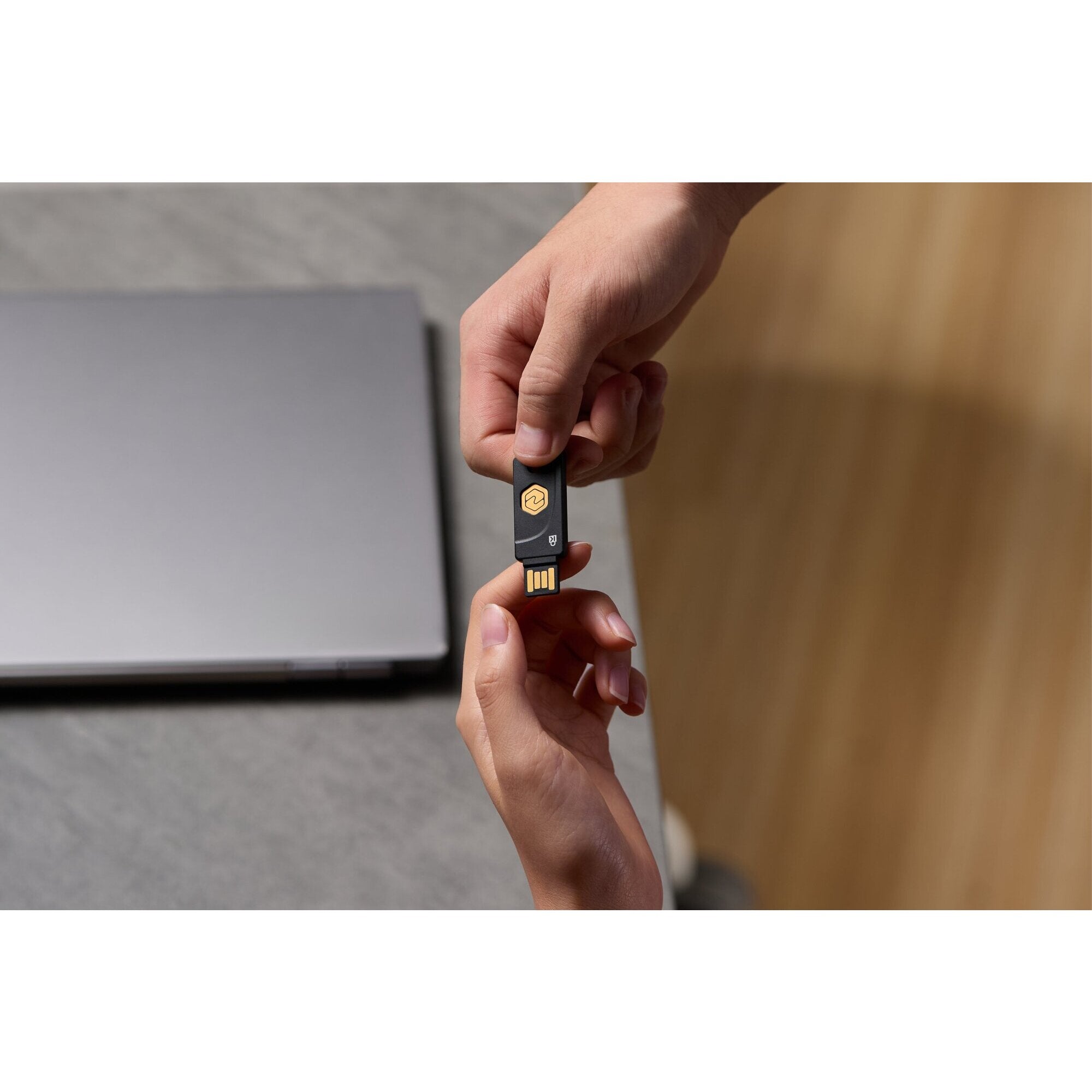 Product view of the black VeriMark NFC Plus USB-A security key showing the FIDO certification branding on the body against white