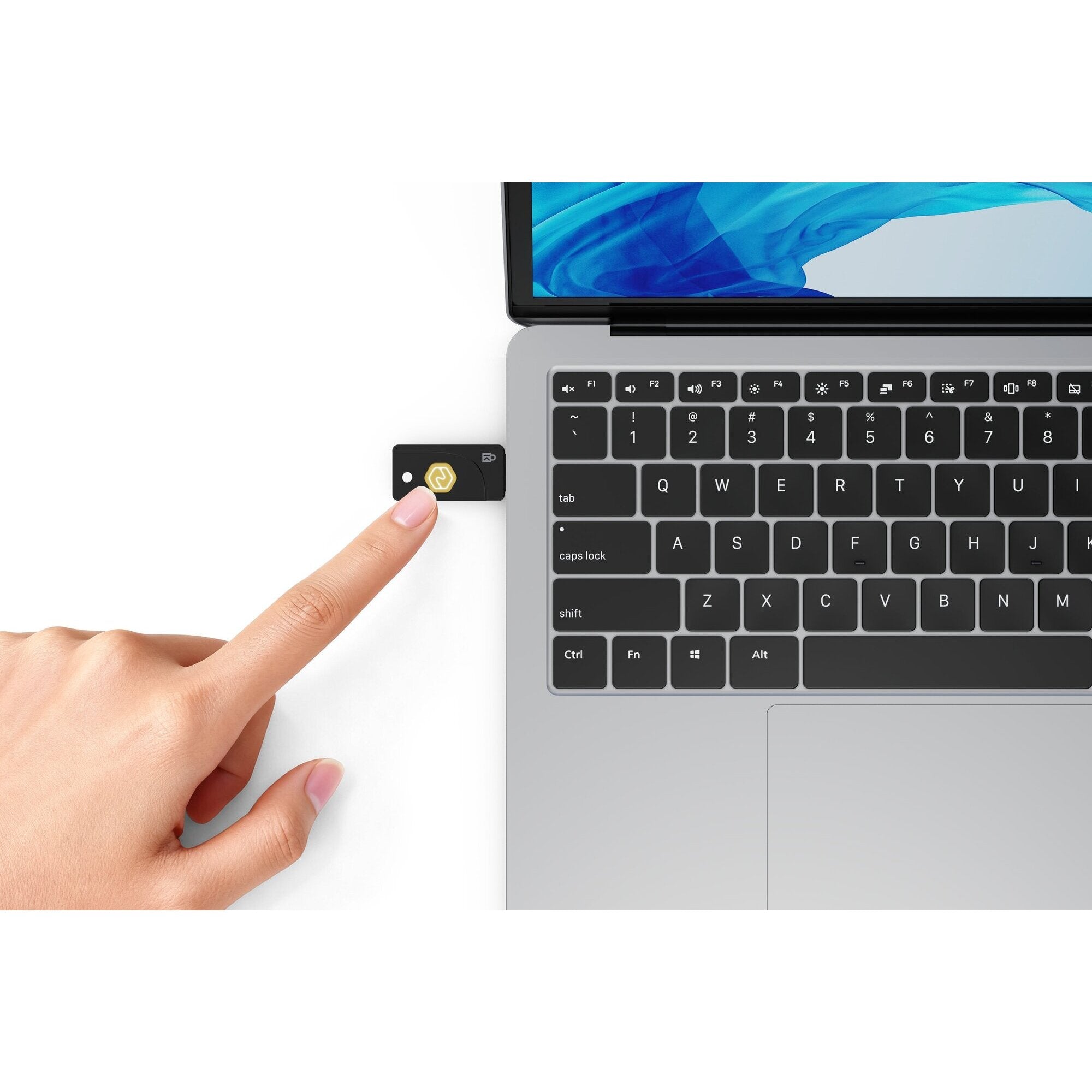 Detail of the Kensington VeriMark NFC Plus security key showing the touch surface used for physical tap authentication