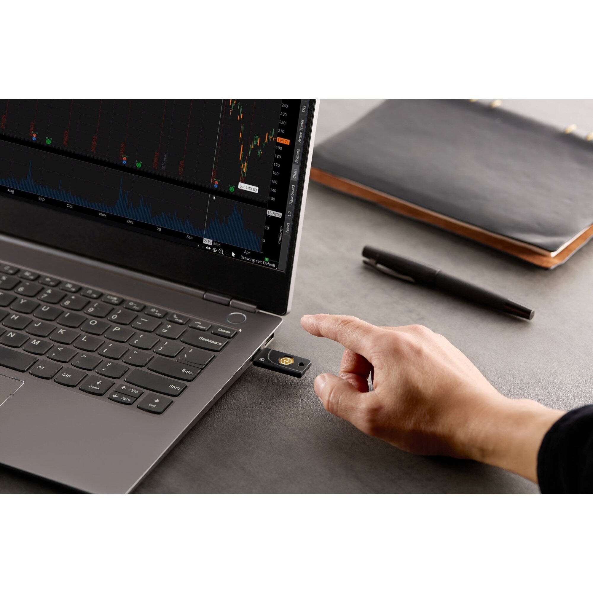 Kensington VeriMark NFC Plus security key held in a hand being tapped against a mobile device to authenticate over NFC