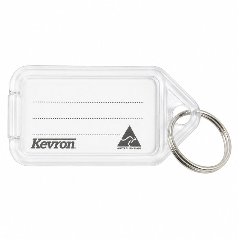 Studio product photograph of the Kevron ID5 Clear Key Tag against a white background. The image clearly displays the transparent plastic body, removable insert, hinged Clicktag design and attached metal split ring.