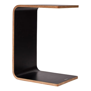 Konfurb Link table in the Black finish standing upright as a C shaped side table, with timber coloured plywood edges