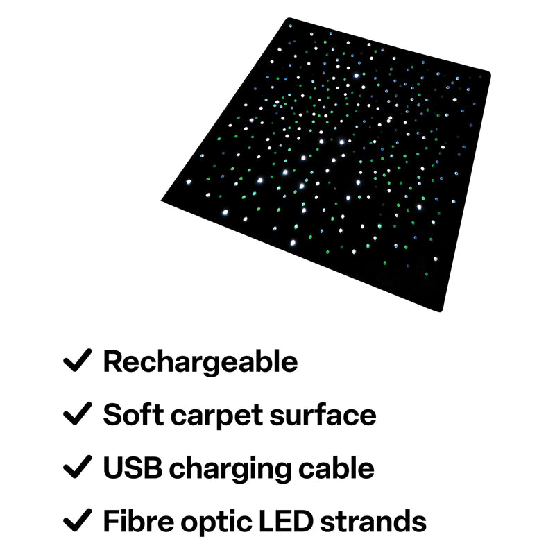 Product feature image of the LED Sensory Carpet highlighting its rechargeable design, soft carpet surface, included USB charging cable and embedded fibre optic LED strands. The angled product view displays the black square surface illuminated with green, blue and white points against a clean white background.