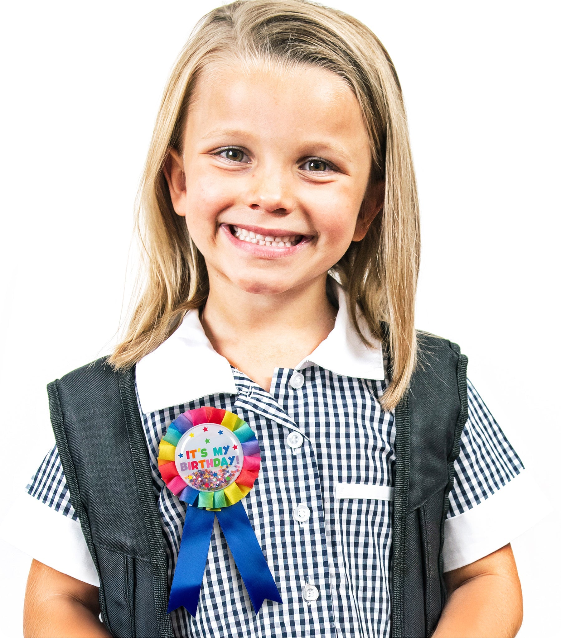 Second view of the rainbow birthday badge showing the confetti settled to one side and the printed design detail.