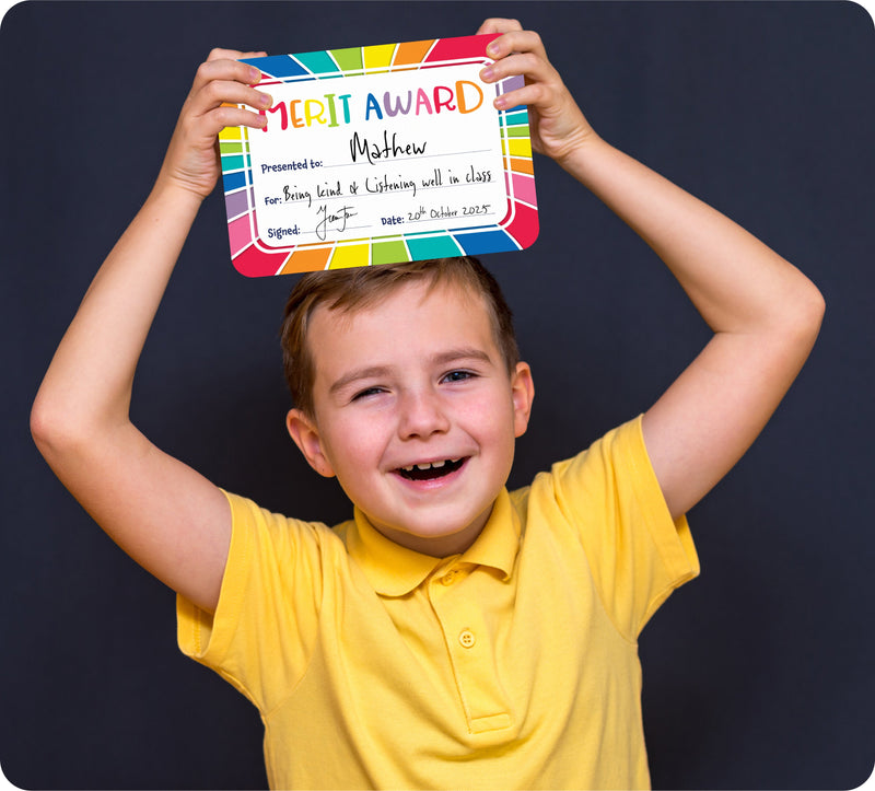 Several Giggle and Grow merit certificates fanned out to show the rainbow design and the pack quantity.