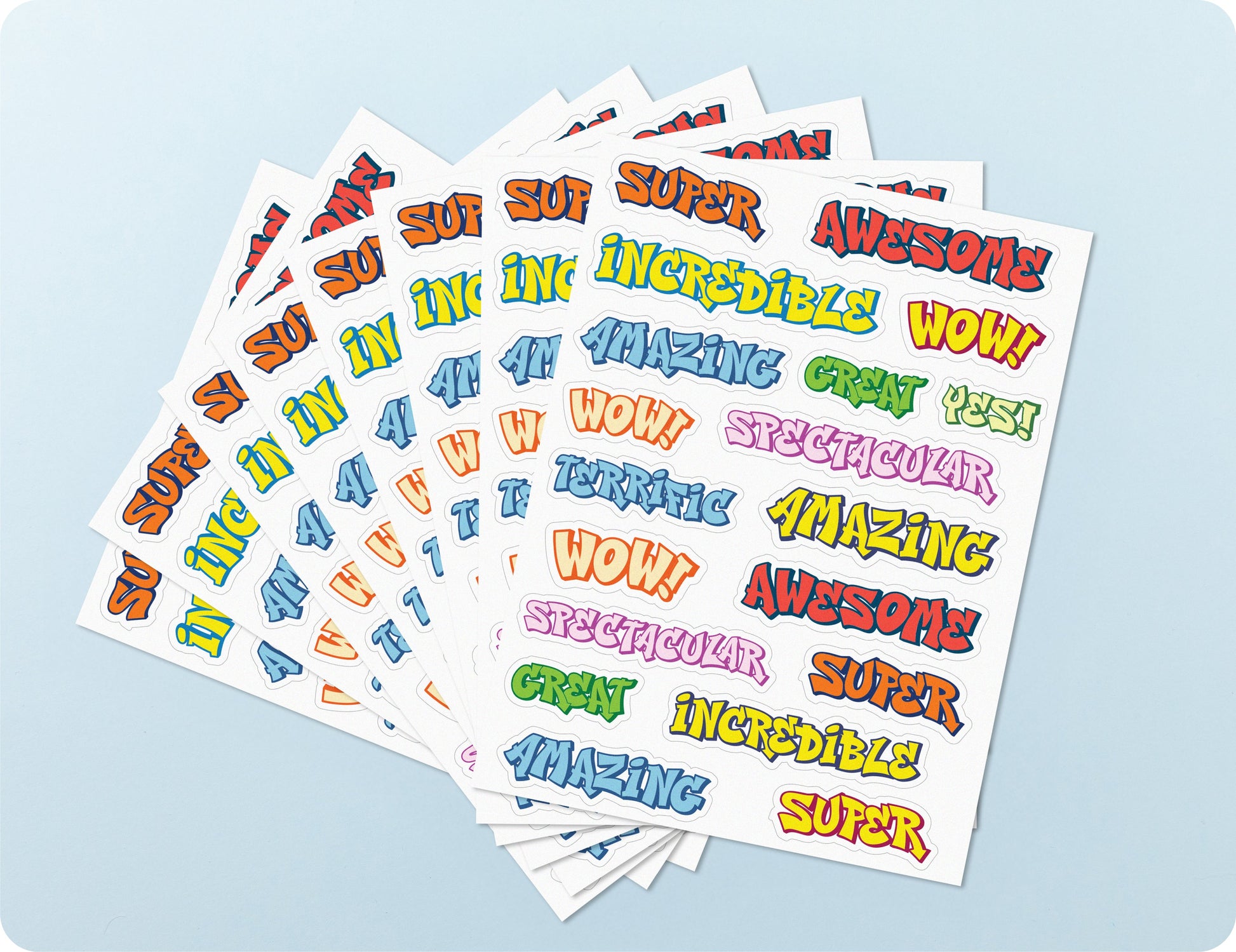 Sticker sheets from the Graffiti Goals book fanned out to show the street-style lettering designs.
