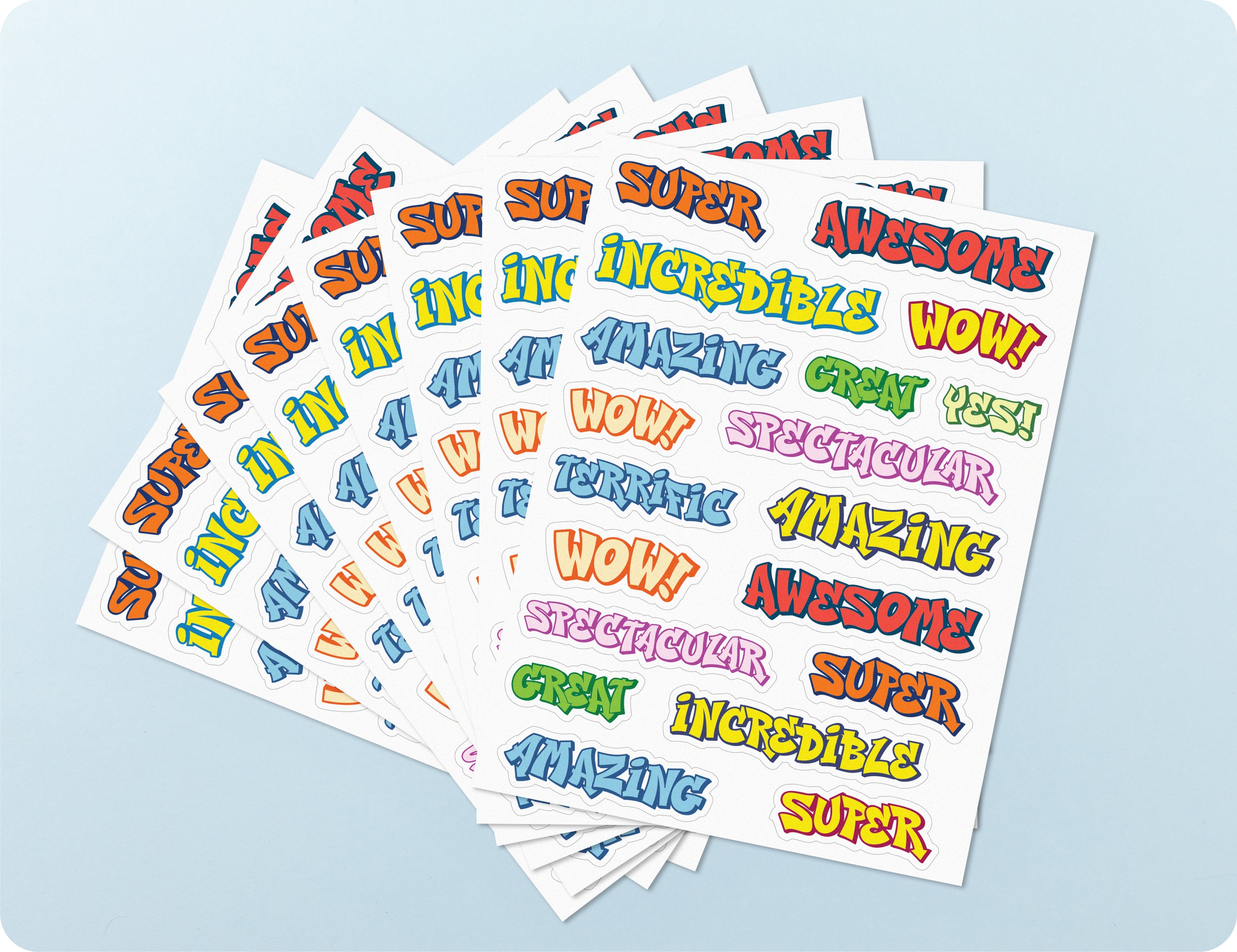 Sticker sheets from the Graffiti Goals book fanned out to show the street-style lettering designs.