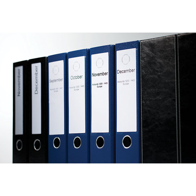 Set of blue binders with labels for each month, arranged in a row.