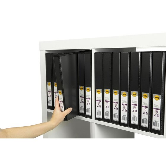 Hand pulling one black Marbig Clearview insert binder from a white shelf of matching black binders with labelled spines