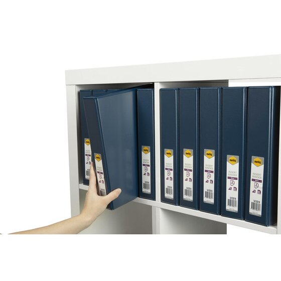 Hand lifting one navy blue Marbig insert binder from a white shelf of matching binders with retail labels