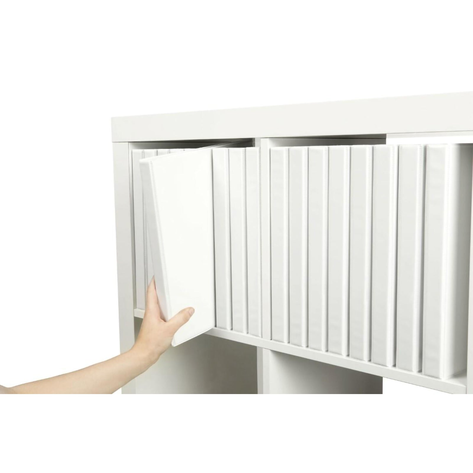 White Marbig Clearview Insert Binder being placed into a filing shelf alongside matching binders, illustrating efficient archive storage, organised document management and easy retrieval.