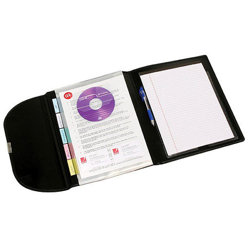 An earlier version of the black Marbig 90069 compendium opened flat, showing five coloured tabs, a CD in a clear sleeve, a pen and a lined writing pad.