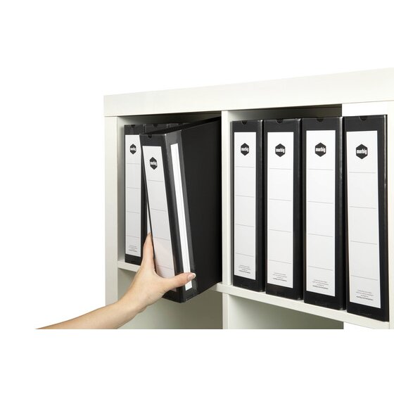 Hand taking a black Marbig Deluxe binder from a white shelf lined with matching black binders carrying white spine labels