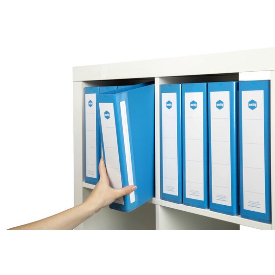 Shelf of blue Marbig Deluxe binders with white spine labels as a hand pulls one out