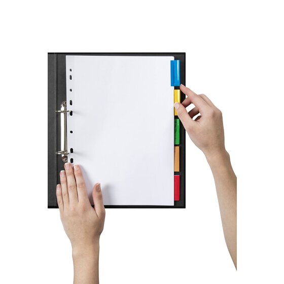 Hand turning a blue insert tab on a Marbig 5 insert tab divider set filed in a black A4 ring binder