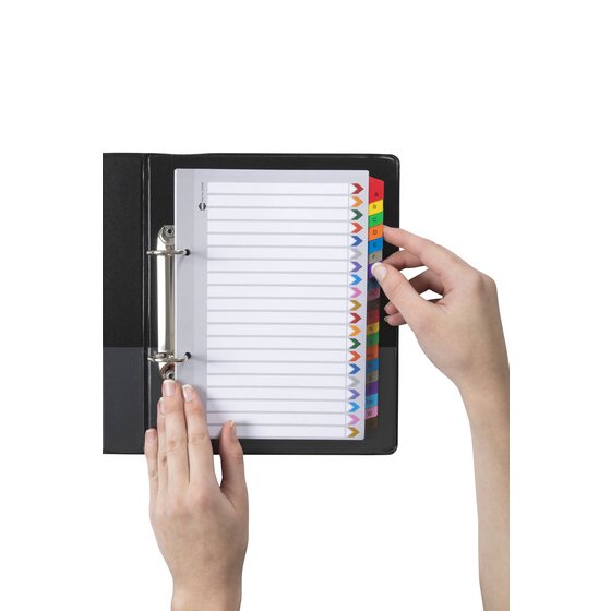 Hands turning a coloured tab in the Marbig A to Z A5 reinforced divider set filed in a small black 2 ring binder