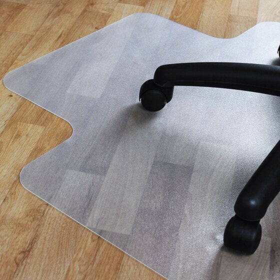 Black chair castors on a clear Marbig keyhole chairmat laid over timber floorboards, the boards visible through the mat