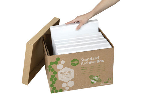 Hand loading white files upright into an open Marbig Standard Archive Box
