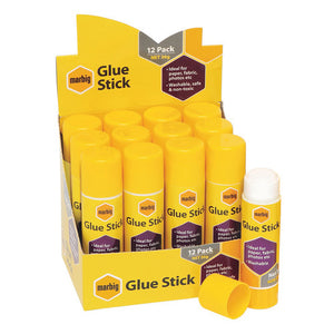 Open yellow Marbig glue stick display box printed 12 Pack Net 36g holding yellow sticks, with one stick uncapped to show the white glue