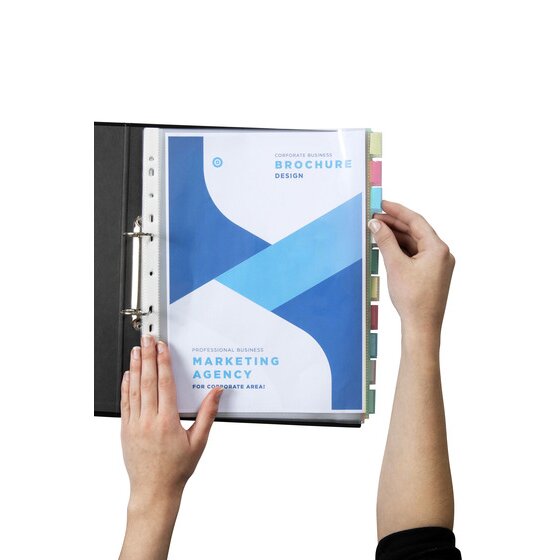 Hands turning a Marbig clear pocket divider holding a brochure inside a black A4 ring binder, coloured tabs on the right