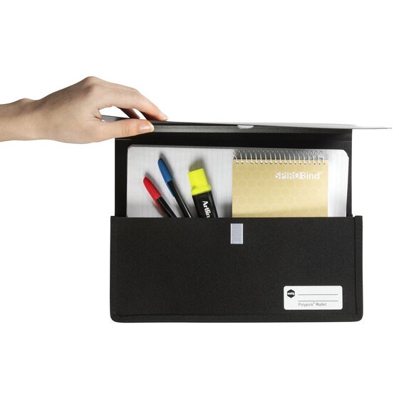 Hand lifting the flap of a black Marbig heavy duty A4 wallet packed with pens, a highlighter and a notebook, with the gusset open