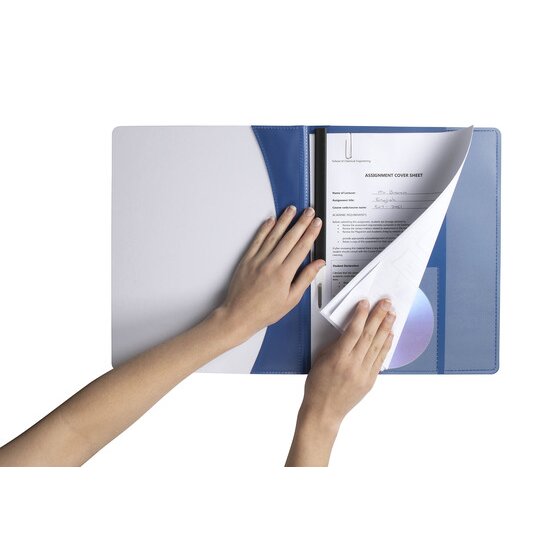 Hands adding punched pages under the black slide bar of a blue Marbig Premier flat file with a disc in the back pocket