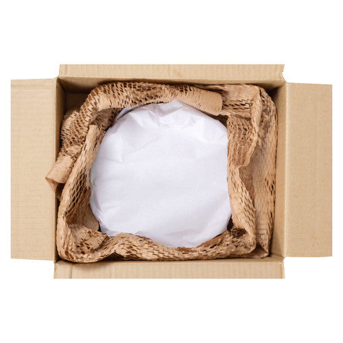 Open carton with a white wrapped item surrounded by crumpled brown honeycomb packing paper