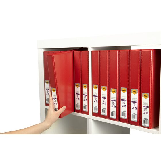 Arm reaching into a white shelf unit to pull out one red Marbig insert binder from a row of labelled red binders