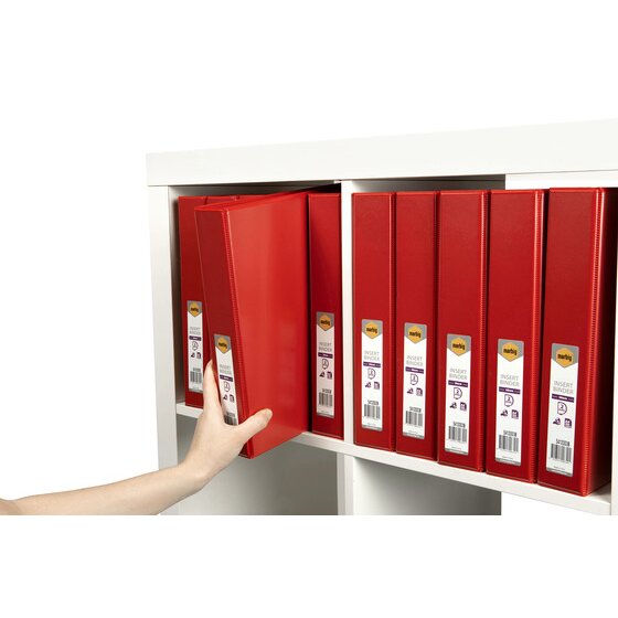 Hand pulling a red Marbig insert binder from a white shelf of matching red binders with retail spine labels