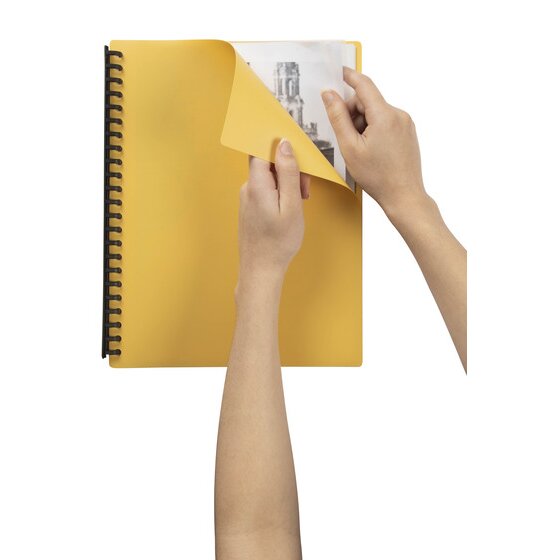 Hands lifting the yellow cover of a Marbig 40 pocket display book to show a black and white building photograph inside