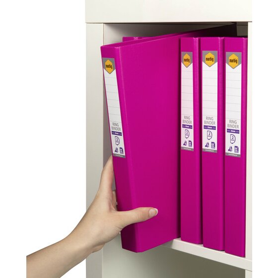 Hand pulling a pink Marbig binder off a shelf of matching pink binders with 25mm 2 ring spine labels