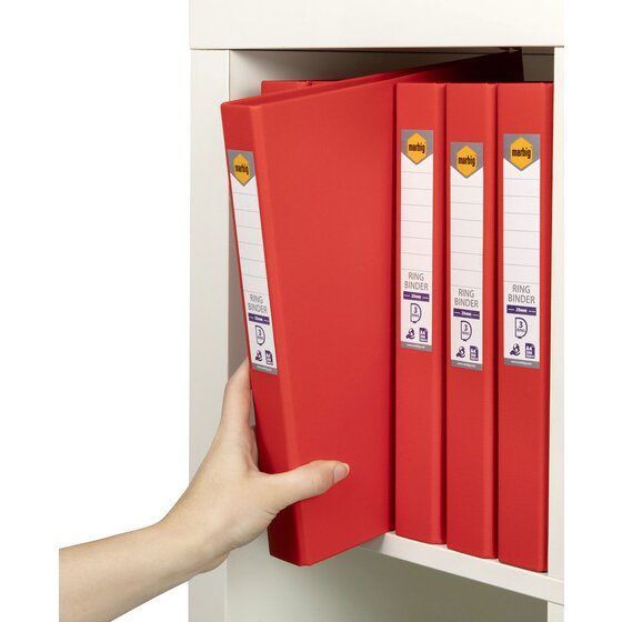 Hand removing a red Marbig binder from a shelf of red binders with spine labels showing 25mm and 3 ring