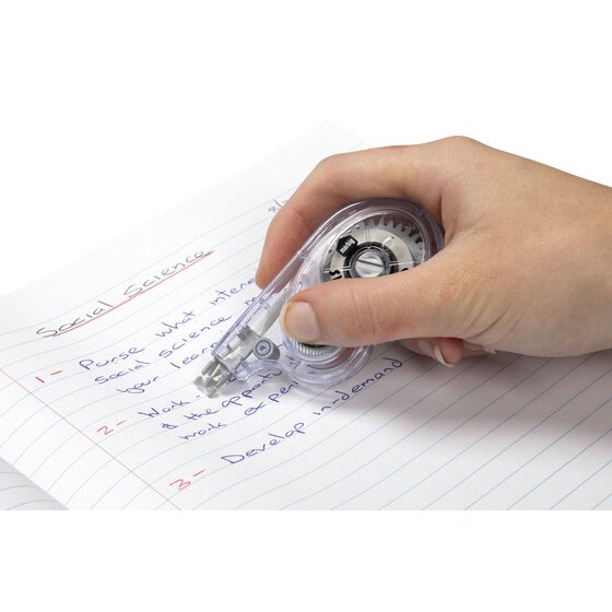 Hand drawing a Marbig Sidewinder correction tape across handwritten notes on lined paper