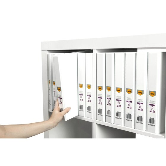 Hand pulling a white Marbig insert binder out of a white shelf filled with labelled white binders