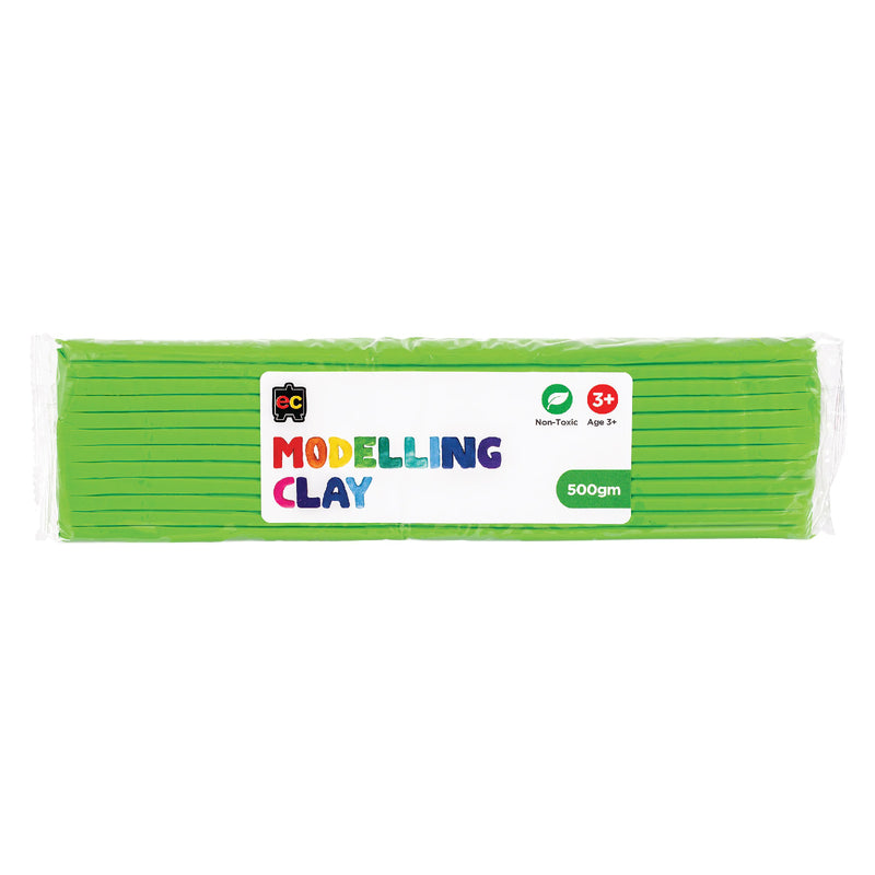 A packaged 500g block of Educational Colours Green Modelling Clay wrapped in clear plastic with a colourful branded label. The packaging highlights the non toxic formula and suitability for children aged 3 years and above, presenting the reusable clay designed for sculpting, arts, crafts and educational modelling activities.