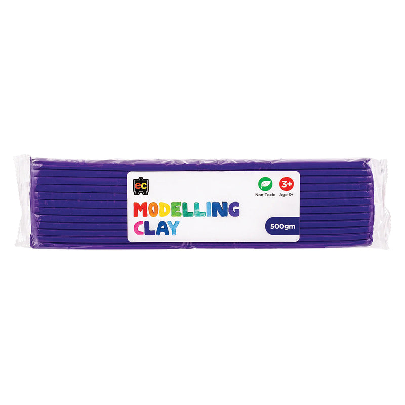A packaged 500g block of Educational Colours Purple Modelling Clay wrapped in clear plastic with a colourful branded label. The packaging highlights the non toxic formula and suitability for children aged 3 years and above, presenting the reusable clay designed for sculpting, modelling, arts and educational craft projects.