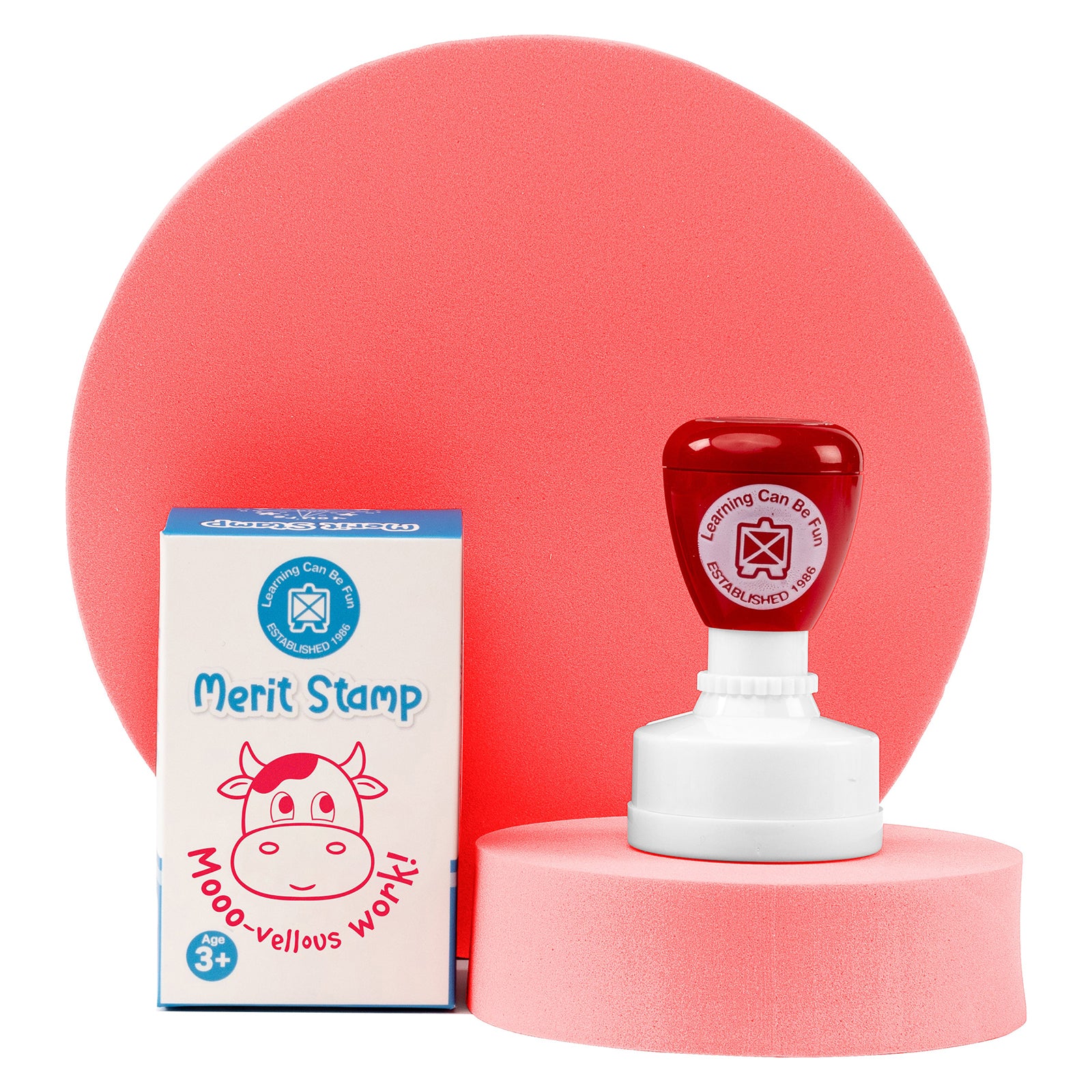 Retail packaging and Mooo vellous Work Merit Stamp displayed together on a presentation stand. The packaging showcases the friendly cow character and motivational message, making it an appealing classroom reward resource.