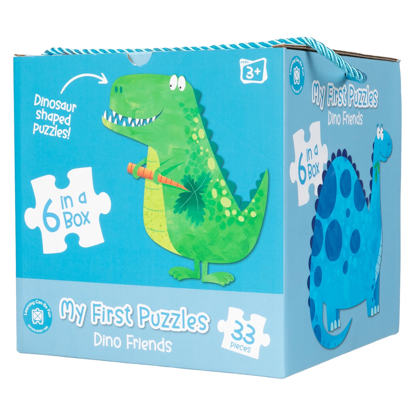 Retail packaging for Learning Can Be Fun My First Puzzles Dino Friends featuring a colourful green dinosaur illustration, convenient carry handle, and details showing six puzzles with 33 total pieces.