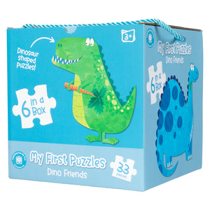 Retail packaging for Learning Can Be Fun My First Puzzles Dino Friends featuring a colourful green dinosaur illustration, convenient carry handle, and details showing six puzzles with 33 total pieces.