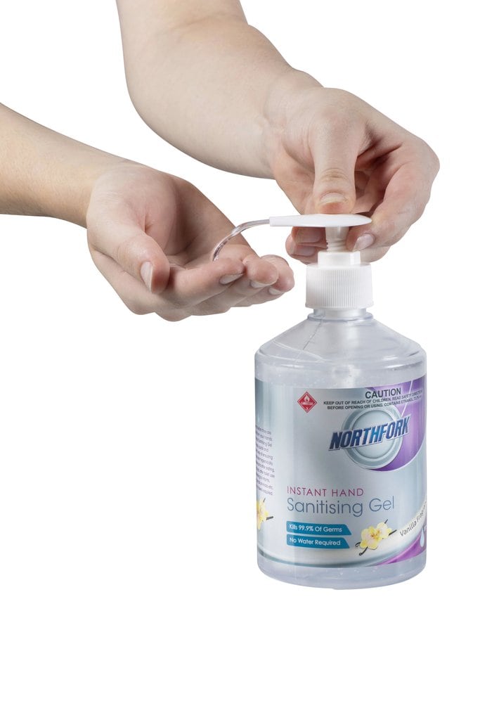 Hand pressing the pump on a Northfork instant hand sanitising gel 500ml bottle to dispense gel into the other palm, from a carton of 12