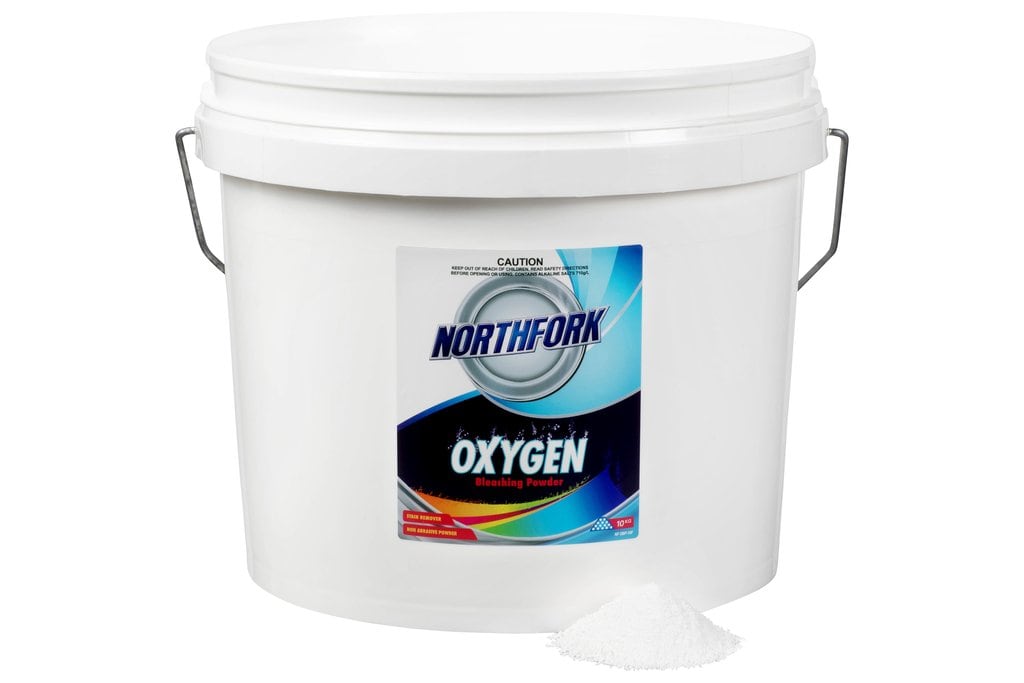 Open Northfork Oxygen Bleaching Powder pail with granular powder beside it